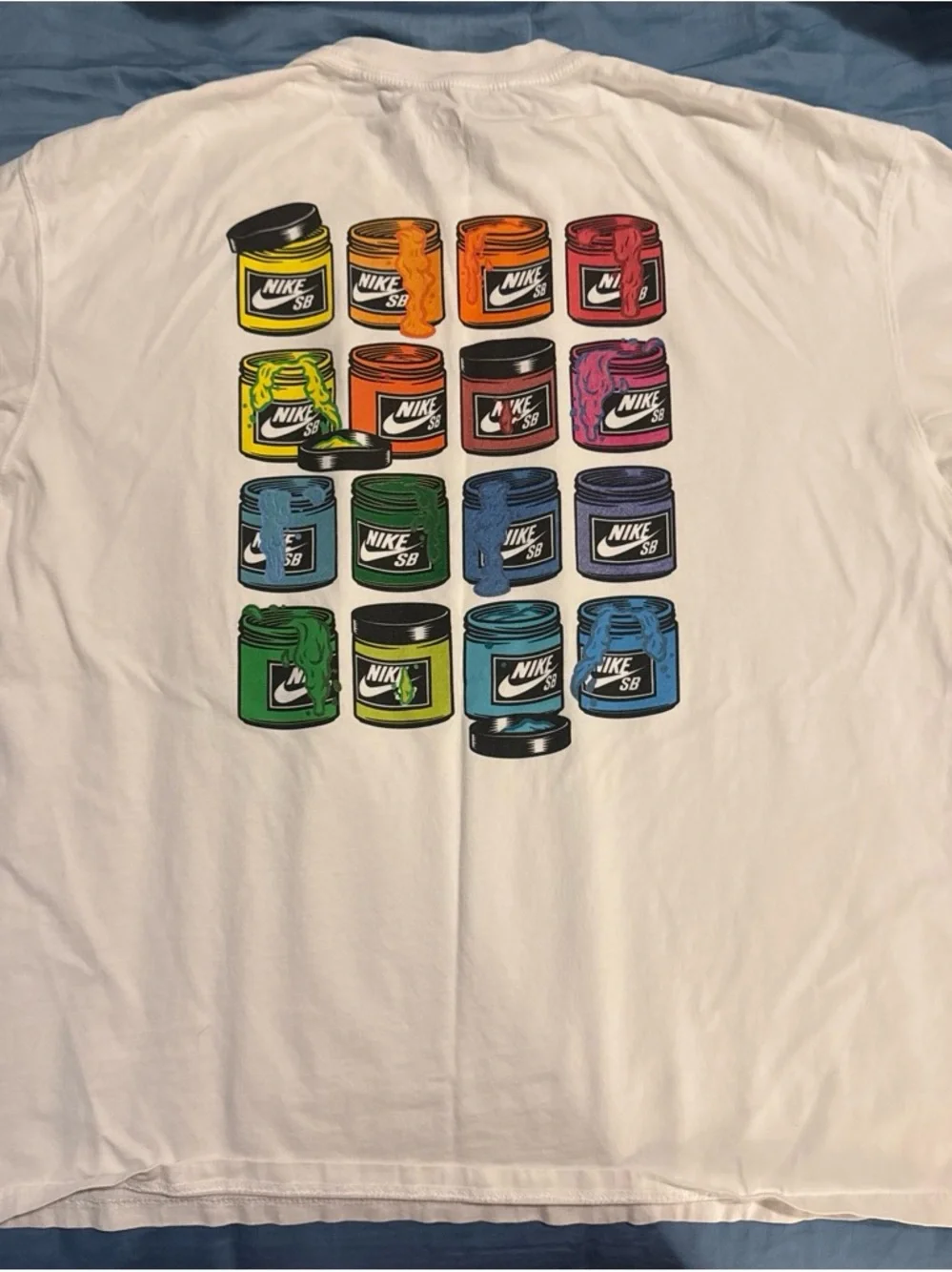 Nike White Short-Sleeve Tee with Blue Chest Graphic